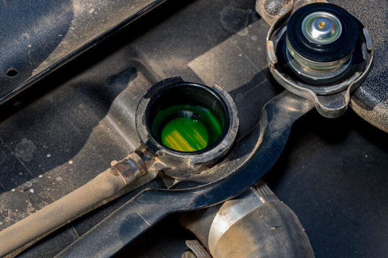 Cooling System Radiator With Cap Removed Showing Green Antifreeze